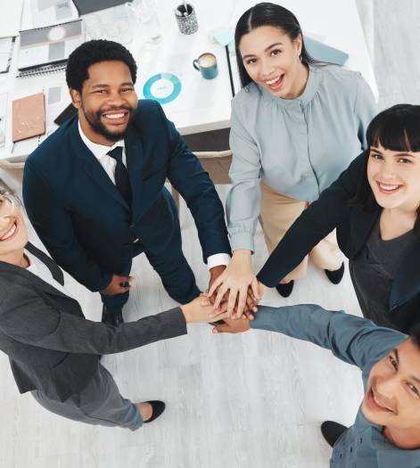 Collaboration, portrait and hands of business people in support of vision, growth and training abov.